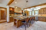 Large kitchen island with seating and lovely view.
